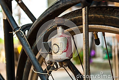 Electric generator (dynamo) on antique bicycle Stock Photo