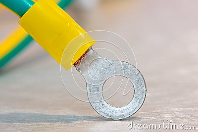 Electric ground cables with insulated ring terminal lug Stock Photo