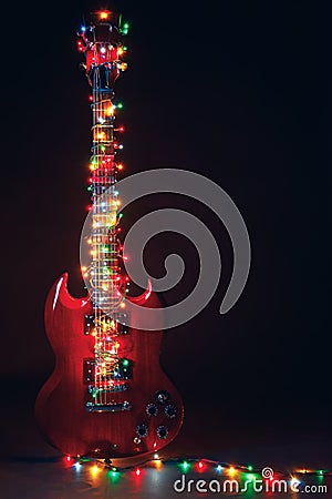 Electric guitar with festive Christmas lights Stock Photo