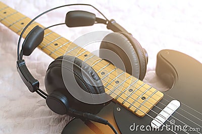 Electric guitar macro abstract and headphones Stock Photo