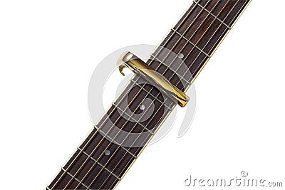 Electric guitar neck with a capo isolated on white background. Stock Photo