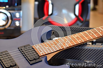 Electric guitar Wallpaper. Blur. Background music. Lessons of guitar playing. String melody. the strings of a musical instrument Stock Photo