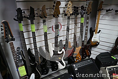 Electric guitars in a musical instrument store Editorial Stock Photo