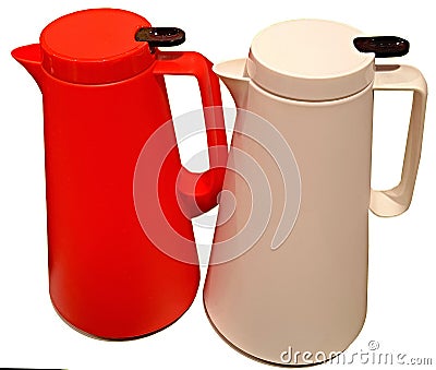 Electric kettle, made of multicolored shiny heat-resistant plastic of modern design and shape on a white background Stock Photo