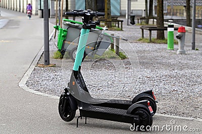 Closeup of a Parked Electric Scooters in ZÃ¼rich, Switzerland Editorial Stock Photo
