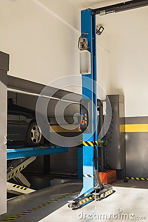 Electric lift in car service Stock Photo