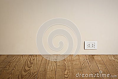 Electric outlet in old wall. Stock Photo