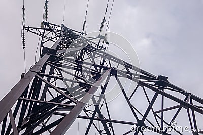 Electric pillar with lots of wires shot from below Stock Photo