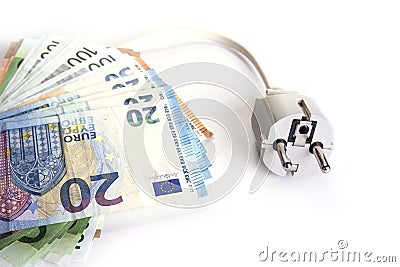 Electric plug with euro money on the white. Energy save concept. Stock Photo