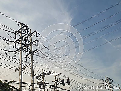 Electric poles wires and cables that connects the system to switch back and forth Stock Photo