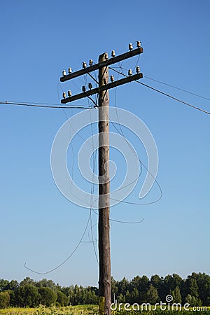 Electric post power pole. Wire breakage after hurricane. Broken power line. Stock Photo