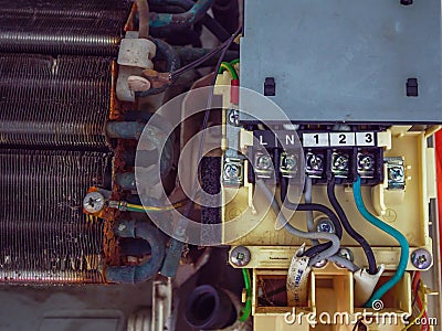 Electric power cord connector of air conditioner evaporator coils panel Stock Photo