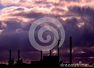 Electric power plant backlit at dawn Stock Photo