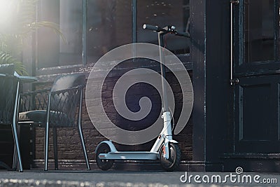 Electric scooter on cityscape background. eco transport concept. 3d rendering Stock Photo