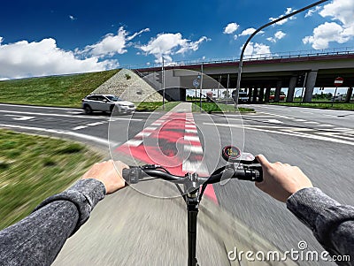 Electric scooter fast ride through bike pathway Stock Photo