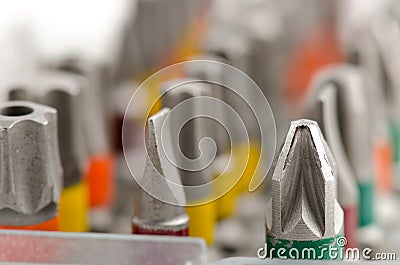 Electric screwdriver blades on white Stock Photo