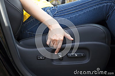 Electric seat adjustment of car Stock Photo