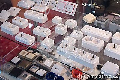 Electric sockets and switches on a show-window of shop Stock Photo