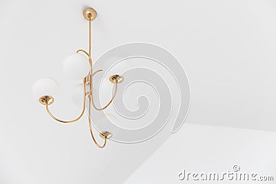 Electric sphere lamp or chandelier hanging from ceiling with copyspace Stock Photo