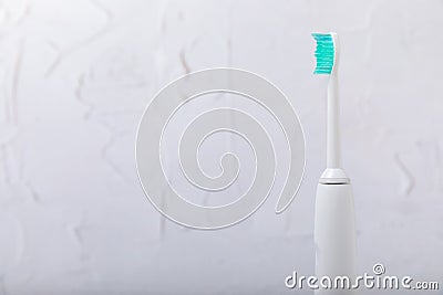 electric toothbrush on marble background Stock Photo