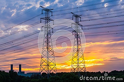 Electric tower at sunset Stock Photo