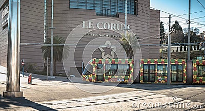 Electric tramway passing the Corum, a convention center and Opera Berlioz in Montpellier, France Editorial Stock Photo