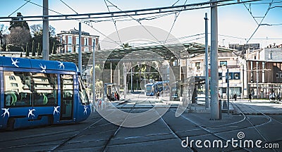 Electric tramway passing the Corum, a convention center and Opera Berlioz in Montpellier, France Editorial Stock Photo