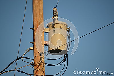 Electric transformer on pole Stock Photo