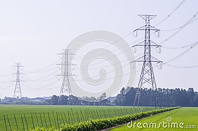 Electric Transmission Tower on filed Stock Photo