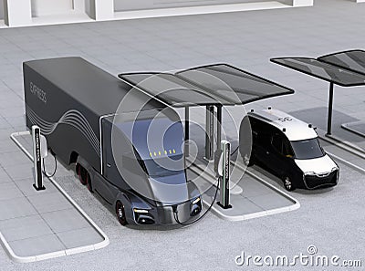 Electric truck and van charging at charging station powered by solar panel system Stock Photo