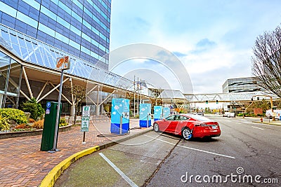 Electric vehicle charging station near World Trade Center in dow Editorial Stock Photo