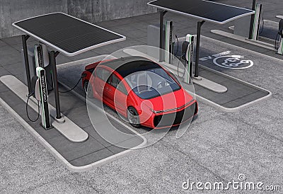 Electric vehicle charging station in public space Stock Photo