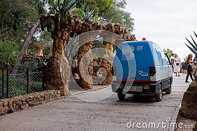 Electric vehicle garbage truck in Park Guell. Barcelona, Spain. Editorial Stock Photo