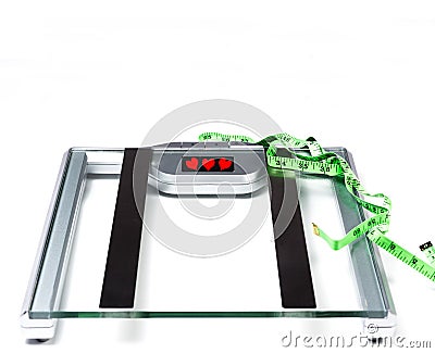 Electrical bathroom scale with measuring tape on white background. Health Concept with copy space Stock Photo