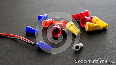 Electrical colorful wire connectors on black background Stock Photo