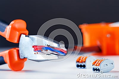 Electrical components and tool. Repair concept. Industry background. Stock Photo