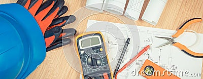 Electrical drawings, multimeter for measurement in electrical installation and accessories for engineer jobs Stock Photo