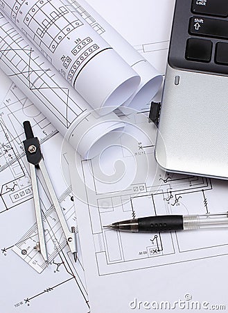 Electrical diagrams, accessories for drawing and laptop Stock Photo