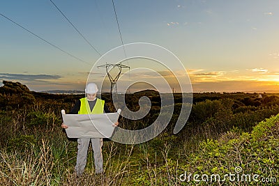 Electrical Engineer Controls the Power Line. Stock Photo