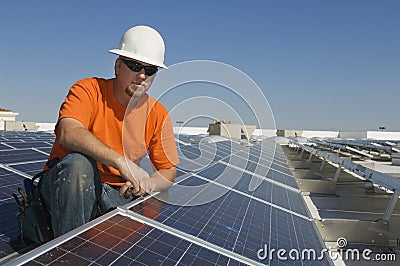 Electrical Engineer At Solar Power Plant Stock Photo
