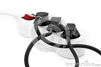 Electrical extension cord with wires inserted into the socket. Stock Photo