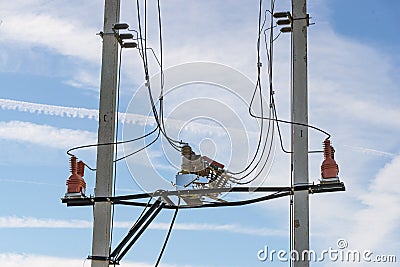 Electrical high voltage fuses on the grey concrete pillars Stock Photo