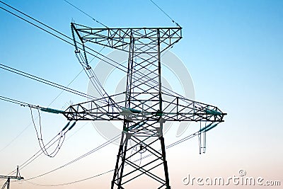 Electrical installation for transmission and distribution of electricity through a network of wires, against the sky Stock Photo