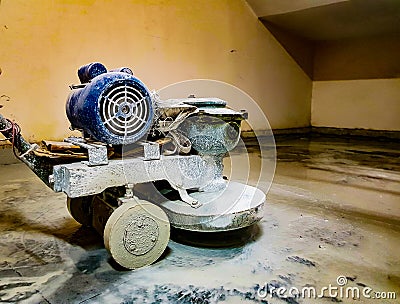 Electrical motorised marble floor polisher in use to polish marbel granite floor Stock Photo