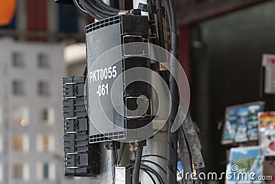 electrical panel mounted on a pole with technical labels Editorial Stock Photo