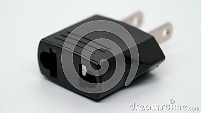 Electrical plug. Adapter from European plug to American or Chinese for travel. Stock Photo