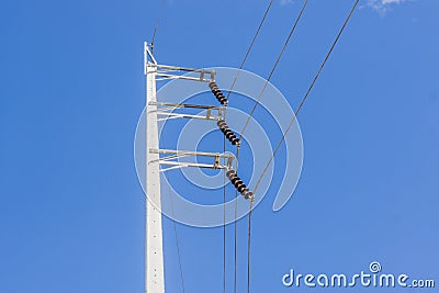 Electrical poles on white cloud and blue sky. Stock Photo