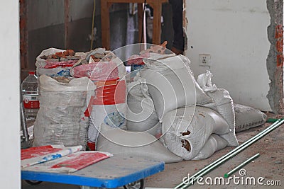 Electrical renovation work, Full construction waste debris bags Stock Photo