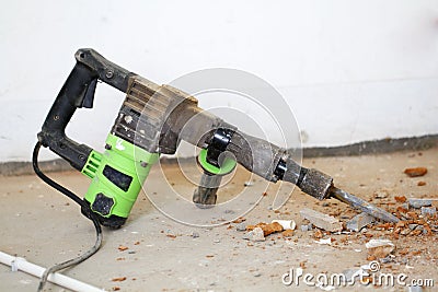 Electrical renovation work, hammer drills in renovation room Stock Photo