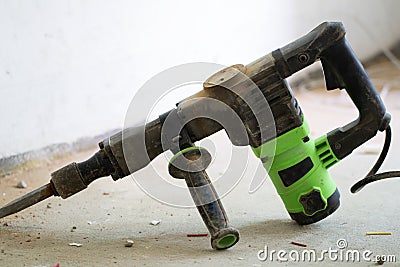 Electrical renovation work, hammer drillsin renovation room Stock Photo